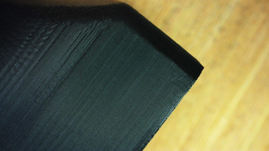 close up of plain black print, displays layer lines