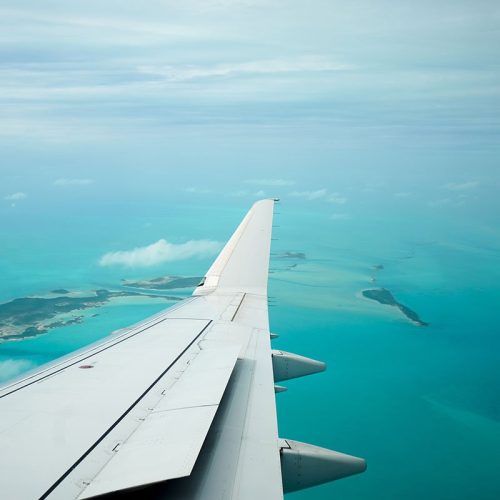 flaps and ailerons in use on a flying aircraft