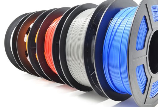 reels of pla filament showing all the colours