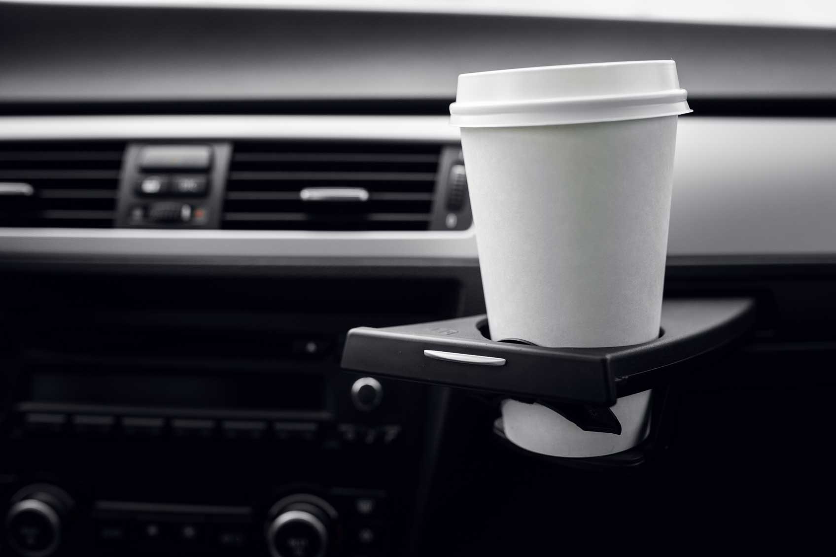 bespoke cupholder attached to car dashboard