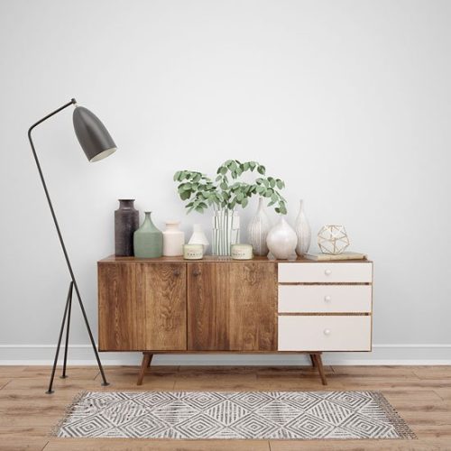 A sleek sideboard with ornaments on top