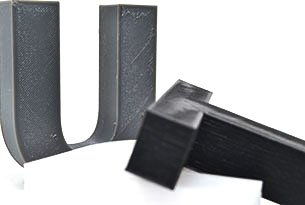 Black TPU letter t and grey letter U